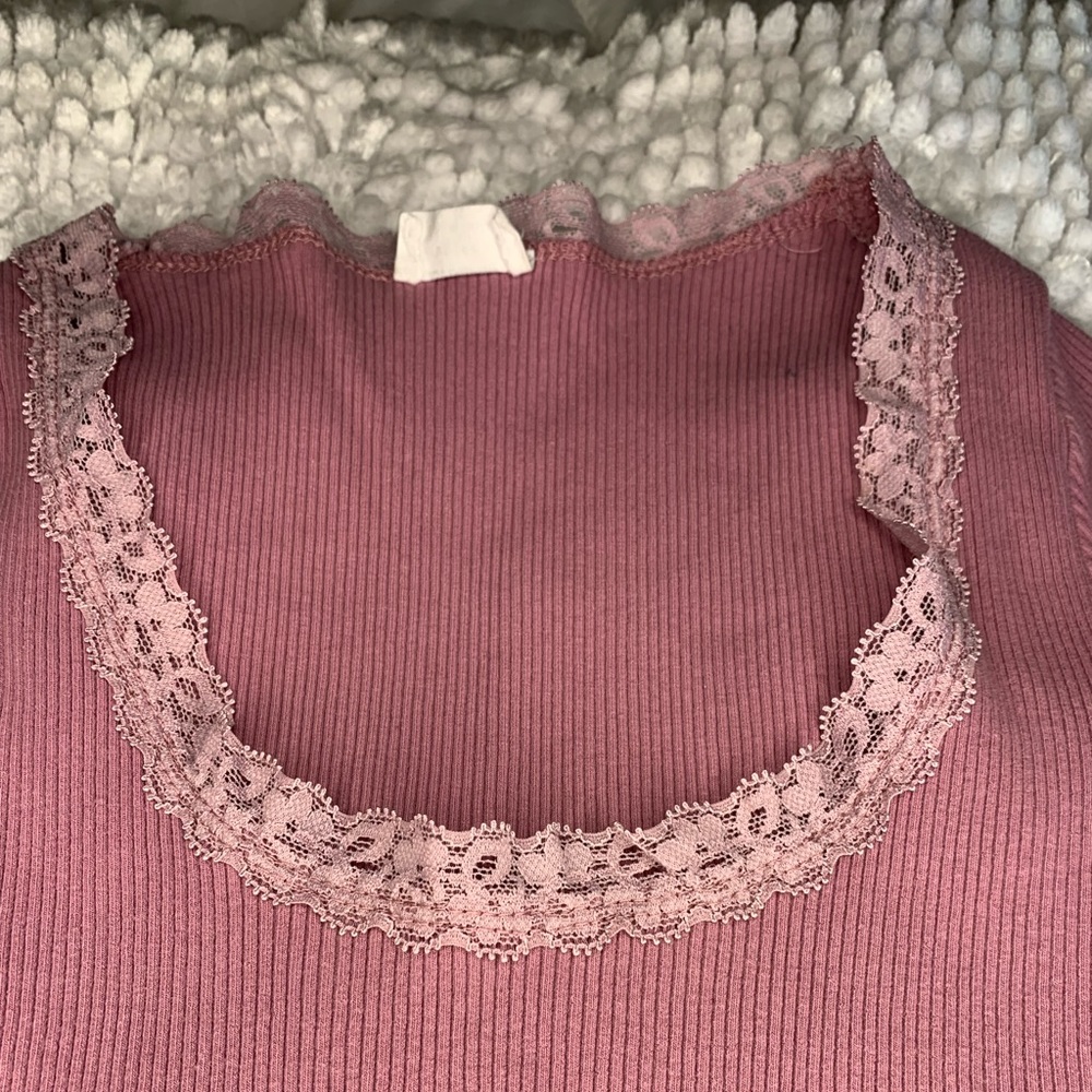 Cotton on Juniors dark pink too with trim lace around the neck line.